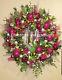 Christmas ornament wreath. Pink, green and silver sparkly Christmas