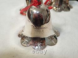 Collection of silver plate Christmas bell ornaments Towle Reed And Barton