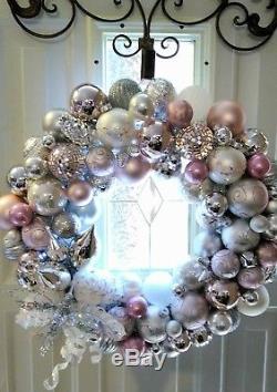 Handmade ornament christmas wreath in pink, silver, and white