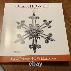 Orange HOWELL 2011 Stellar Legacy Snowflake Ornament USA Flannel Bag Brochure 3