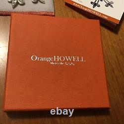 Orange HOWELL 2011 Stellar Legacy Snowflake Ornament USA Flannel Bag Brochure 3