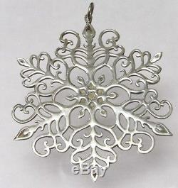 Set of 9 MMA Sterling Silver Snowflake Holiday Christmas Ornament from the 1970s