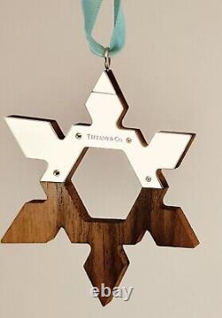 Tiffany & Co Sterling Silver & American Walnut Christmas Snowflake ornament. NEW